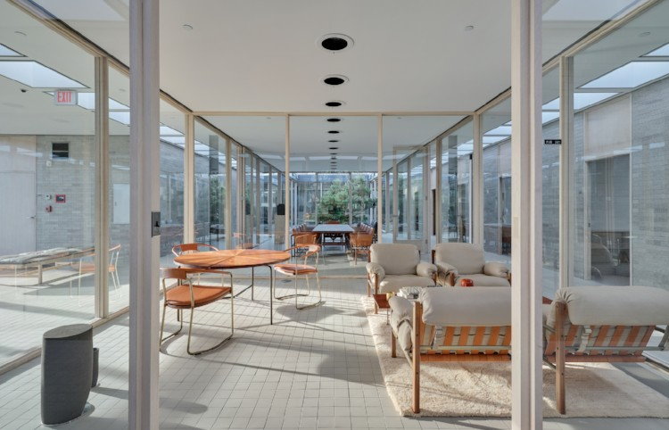a bright, open furniture display with glass walls