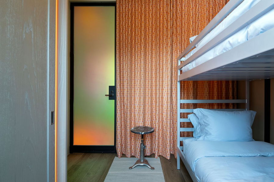 Colorful Kubrick-inspired guest bedroom inside director David Gordon Green's NYC loft.