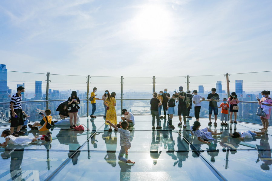 Tourists were quick to sign up for a chance to stand on the horizontal tower's stunning observation deck. 