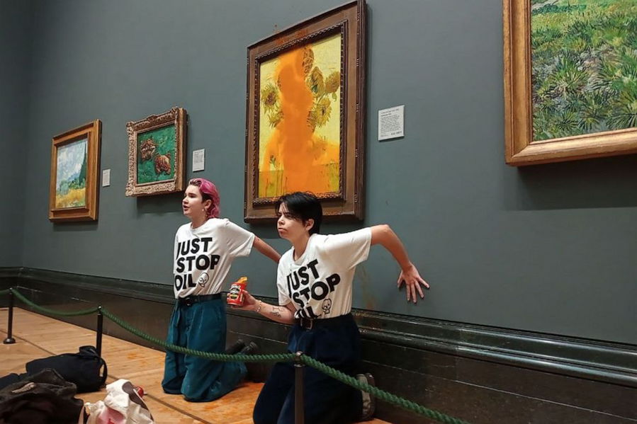 The Just Stop Oil activists glued their hands to the wall after throwing the tomato soup.