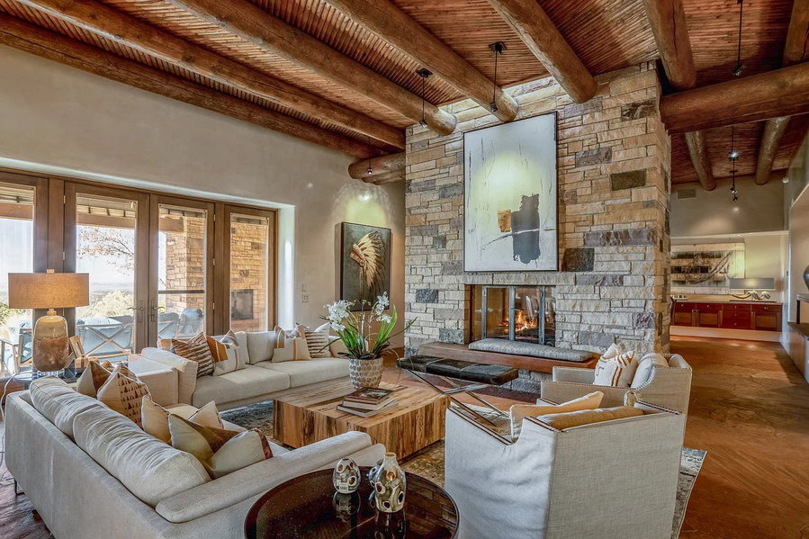 Contemporary living space at 1432 Old Sunset Trail, a sprawling Santa Fe mansion on the market for $8.5 million.