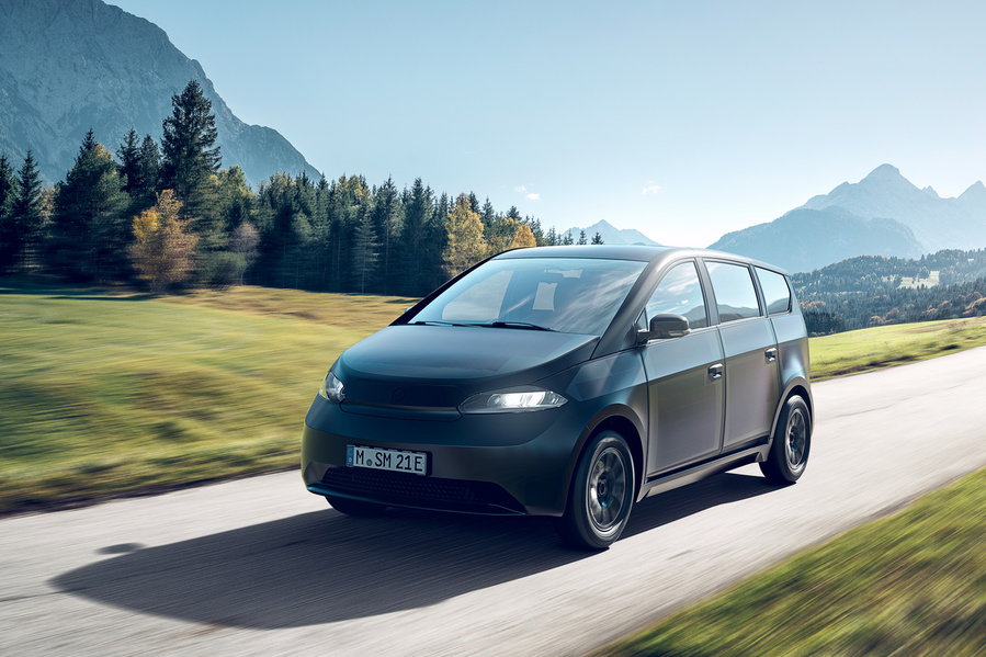 Sono Motors' second-generation Sion Solar electric car cruises through the countryside. 