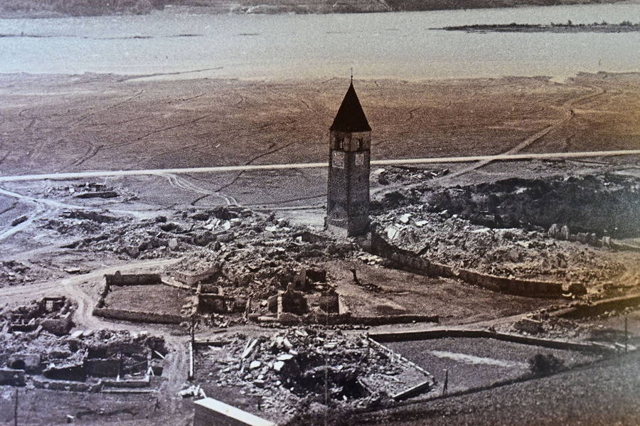 View of Curon and its central bell tower in the 1950s, before the construction of Lake Resia.