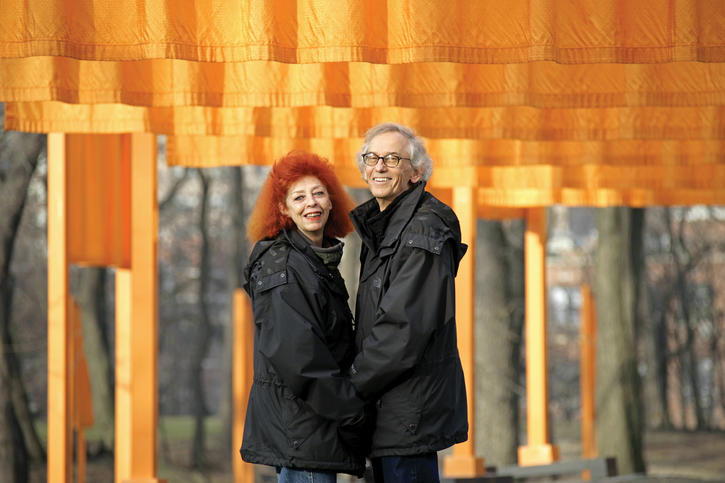 Christo stands in front of an installation with his artistic and romantic partner Jeanne-Claude.