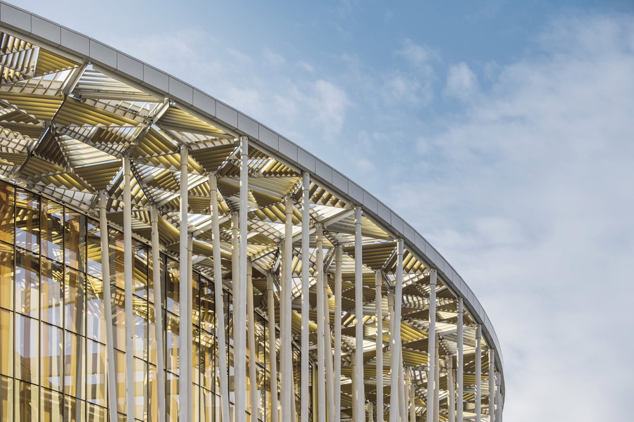 Golden slats adorn the top of the Wuxi Taihu's white columns to create a mock canopy. 