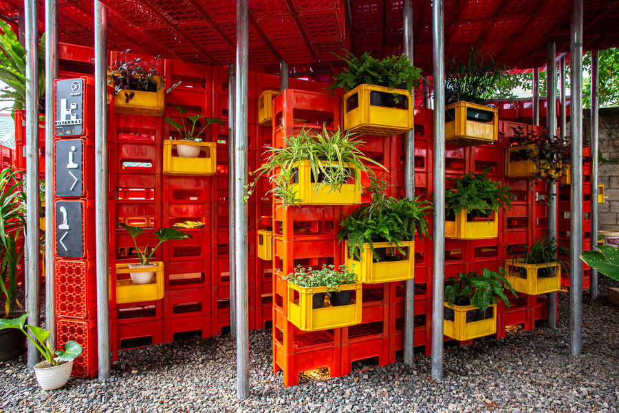 Plastic crates don't just make for great walls and ceilings. They can also be used as functional planters! 