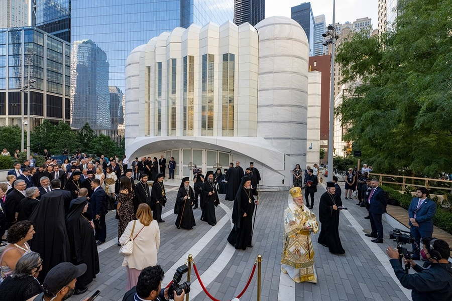 Church officials walked through the World Trade Center Plaza for the restored church's grand re-opening.