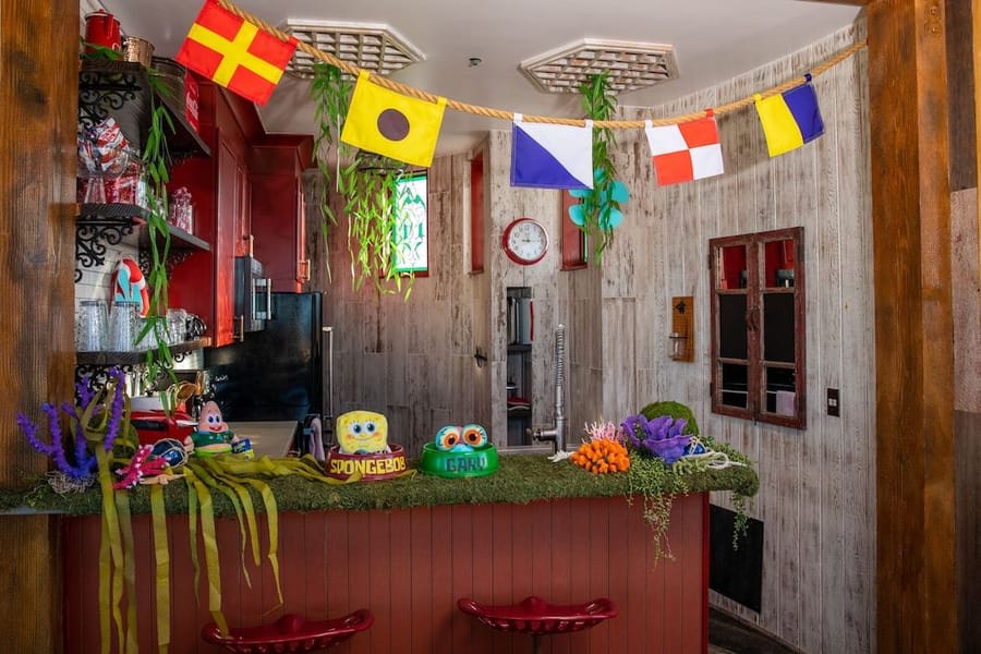 Krusty Krab-inspired bard/kitchen Vrbo's new Spongebob Squarepants-Themed Vacation Rental in Huntington Beach, CA.