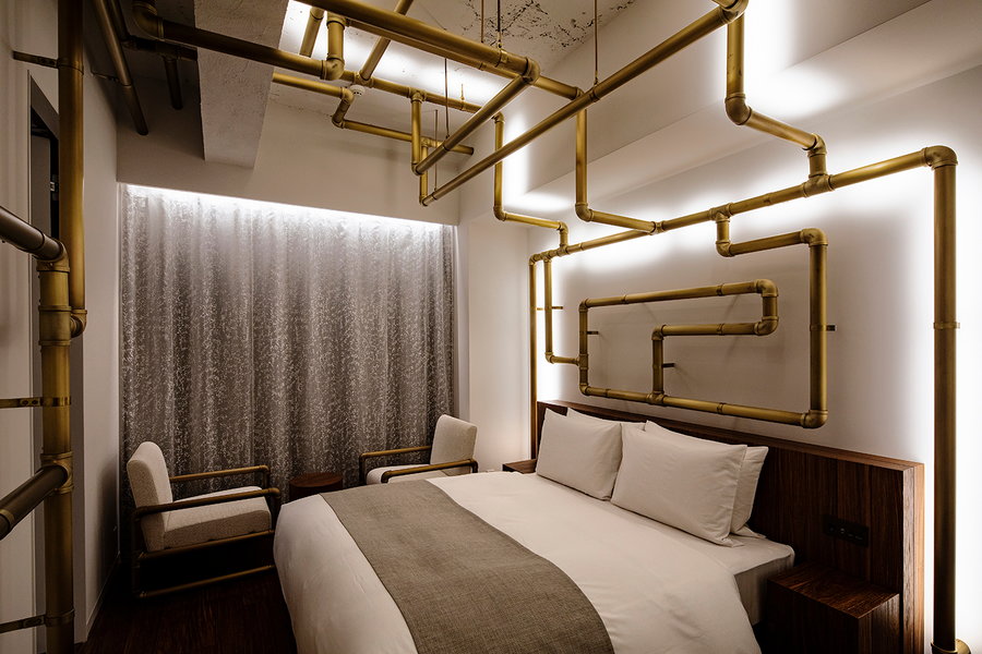 Stylish modern guest room in the Sou Fujimoto-renovated Shiroiya Hotel 