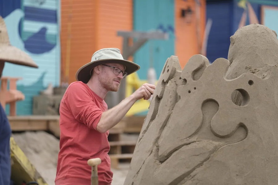 Sand castle artist Guy-Olivier Deveau at work. 
