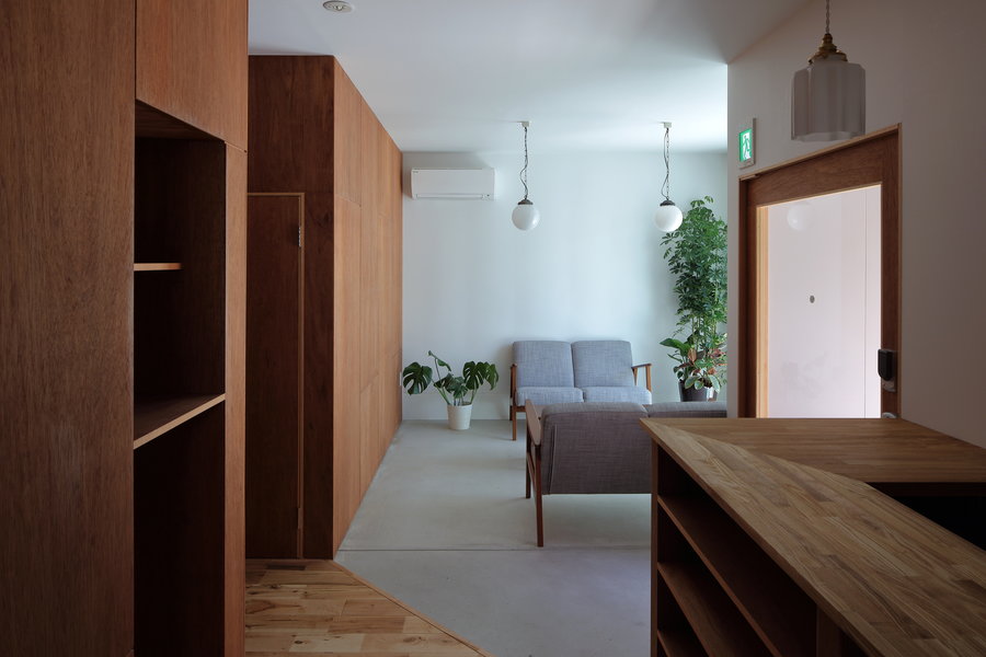 A simple lounge area inside the Kyoto Suiden-ann Hostel.