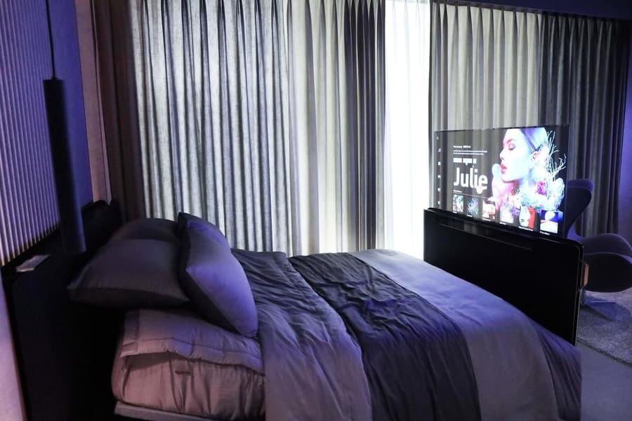 Officially unveiled at CES 2021, LG's futuristic OLED TVs hide neatly at the foot of your bed, popping up when it's time for your favorite show!