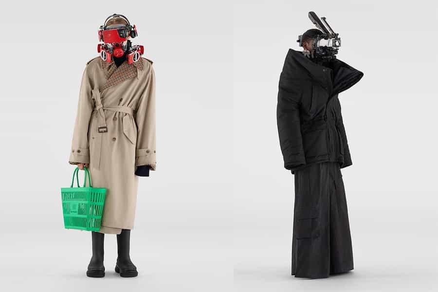 Models sport floor-length trench coats and futuristic robotic masks for Balenciaga's Spring 22 campaign.