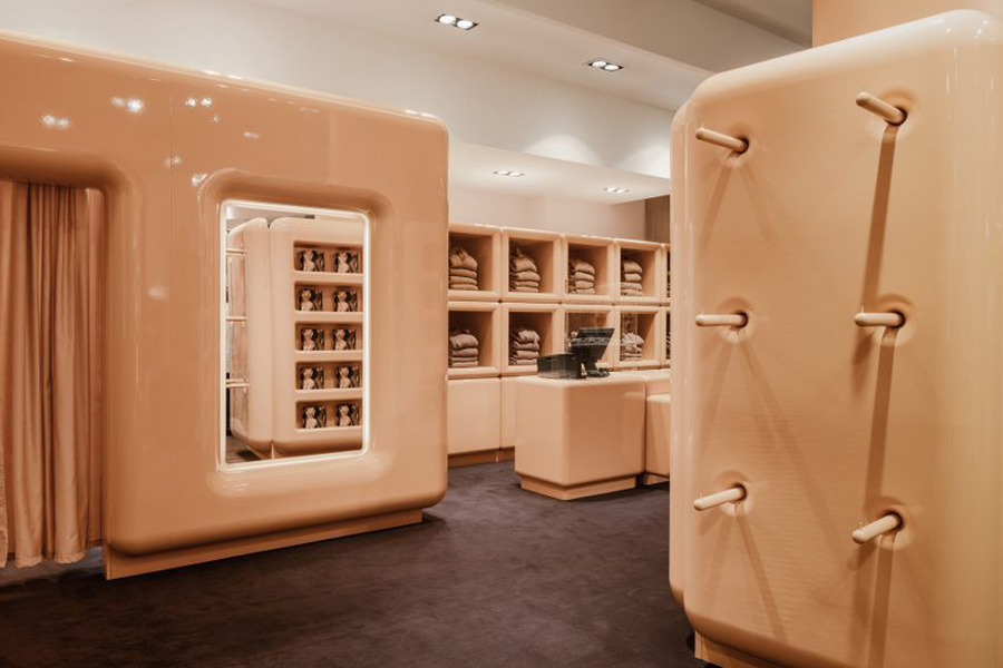 Beige minimalist SKIMS pop-up store in Paris, France, also designed by Perron-Roettinger. 