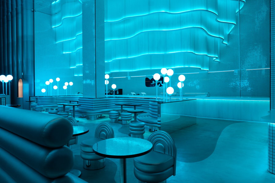 Moody blue lighting gives the MO Bakery a completely different vibe on demand. 