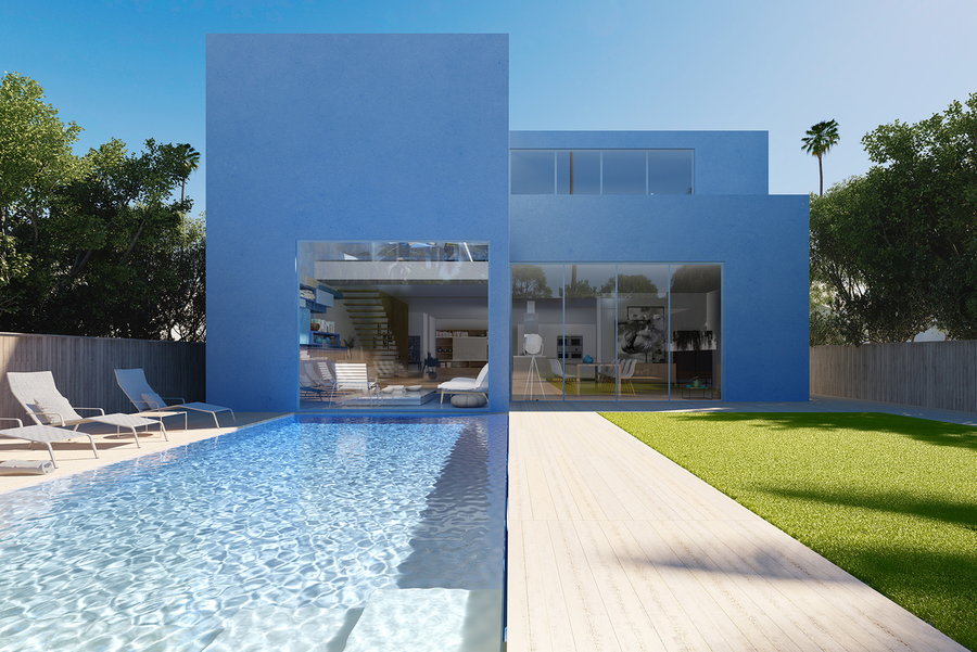 Sleek rectangular pool runs between the palm trees at the Studio Malka-designed Dunk House. 