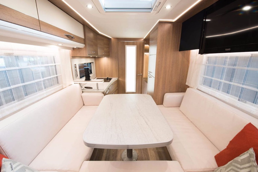 The inside of the solar-powered RV is sleek and luxurious. No sacrifices on quality for sustainability here!