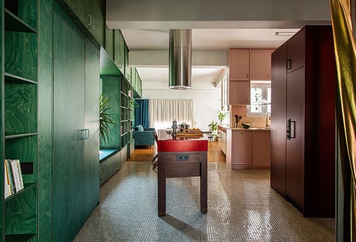 Colorful kitchen area inside Point Supreme's renovated Athens apartment.