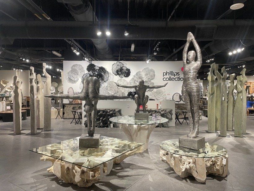 Silver sculptures of women from the Phillips Collection on display at Las Vegas Market.