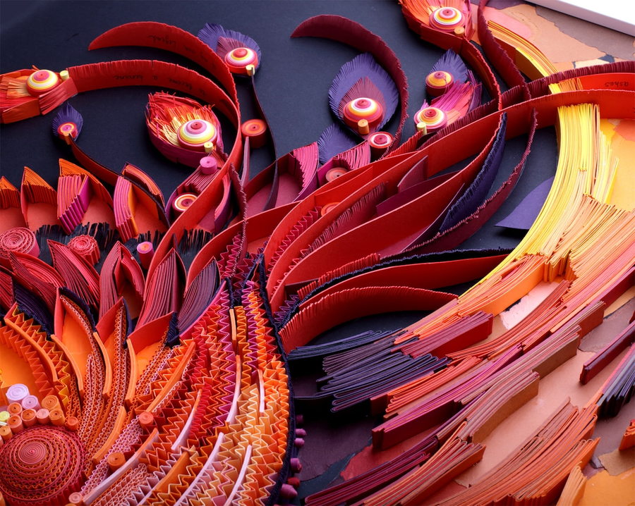 A close look at the Phoenix feathers making up the woman's hair in Yulia Brodskaya's Phoenix artwork.