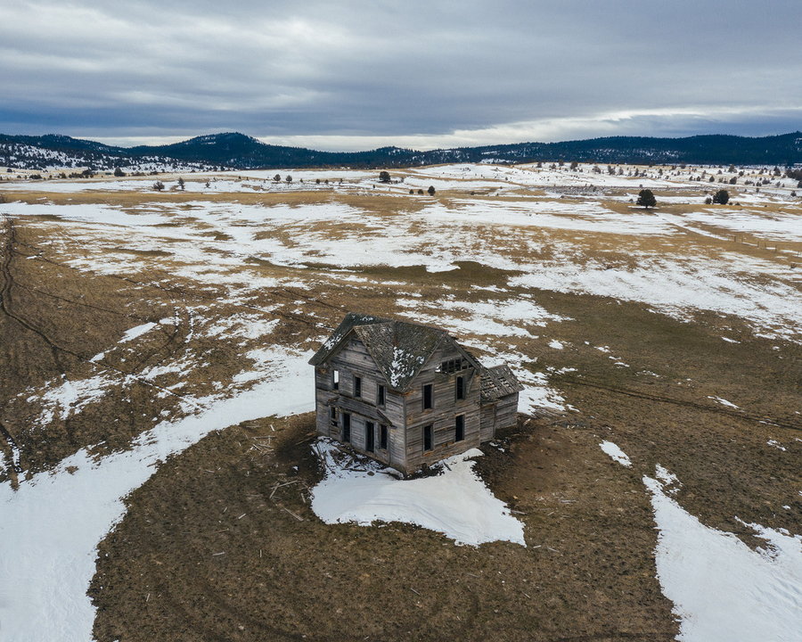 Snowy abandoned farmhouse captured by photographer Brendon Burton for his new 
