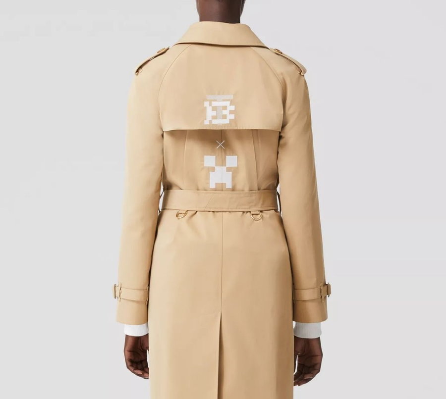 A version of Burberry's Waterloo trench coat featuring a pixelated white Burberry x Minecraft logo on the back.