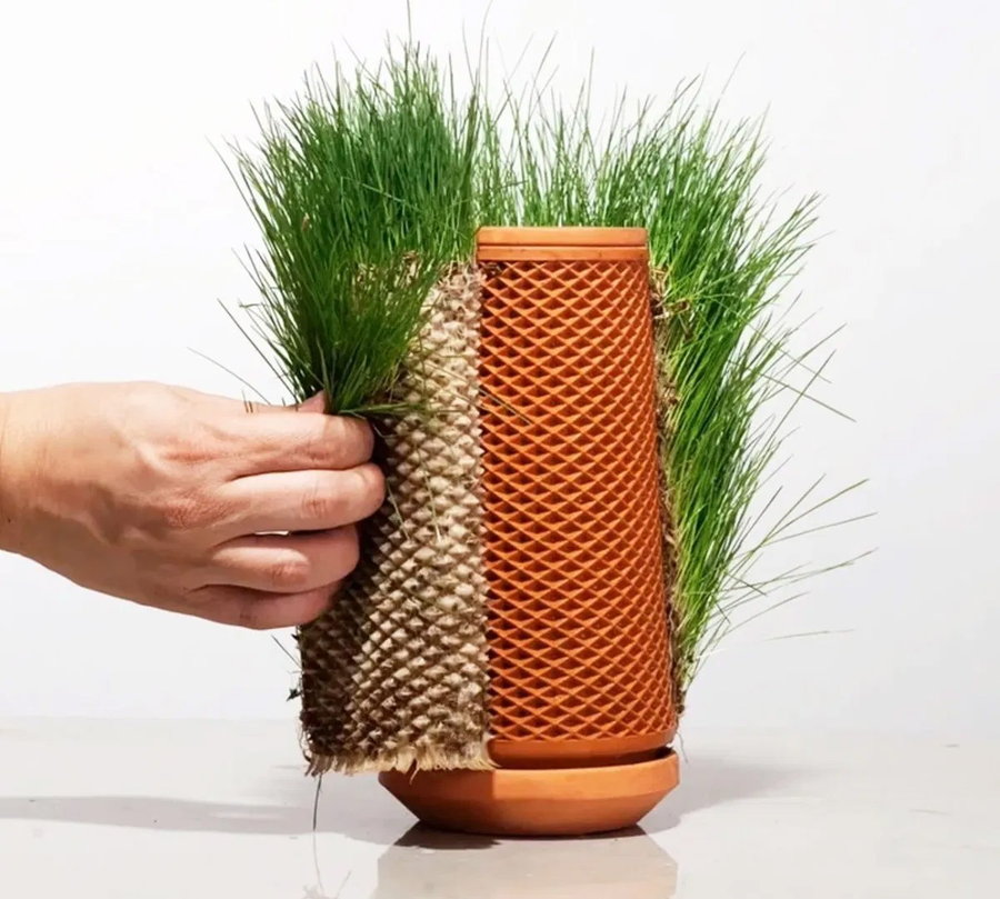 The visually stimulating, water-conscious Terraplanter houseplant container.  