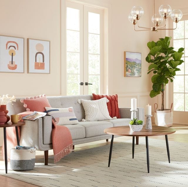 Living room furnished with stylish offerings from Lowe's new 