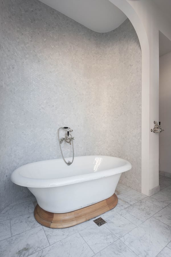 Freestanding bathtub featured in the primary bathroom of Taylor Swift's former NYC home.