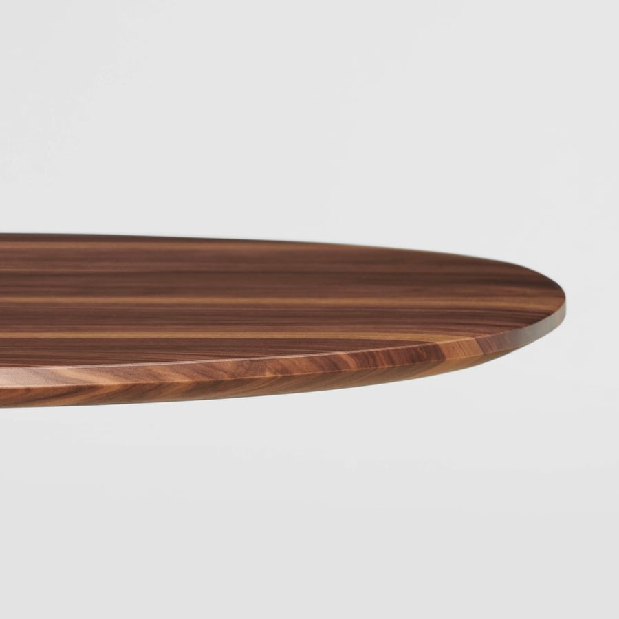 Close-up of the sleek solid wood tabletops featured in Davis Furniture's new 