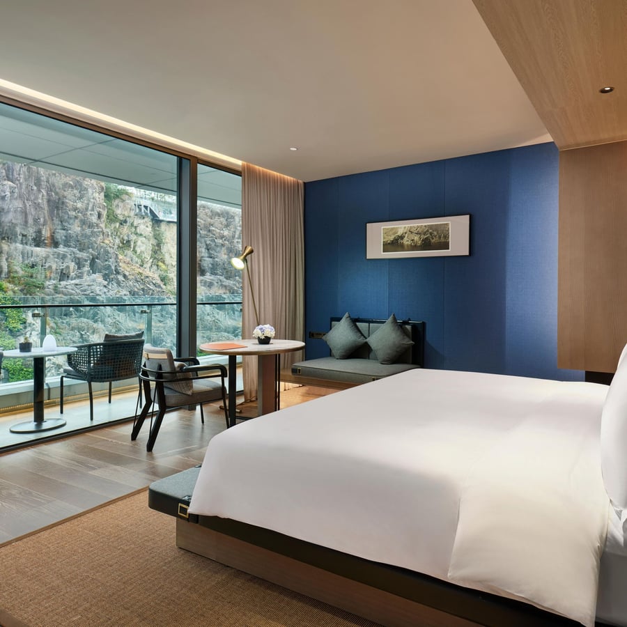 The above-ground rooms in the resort boast modern furniture and gorgeous views of the surrounding cliffs and waterfalls.  