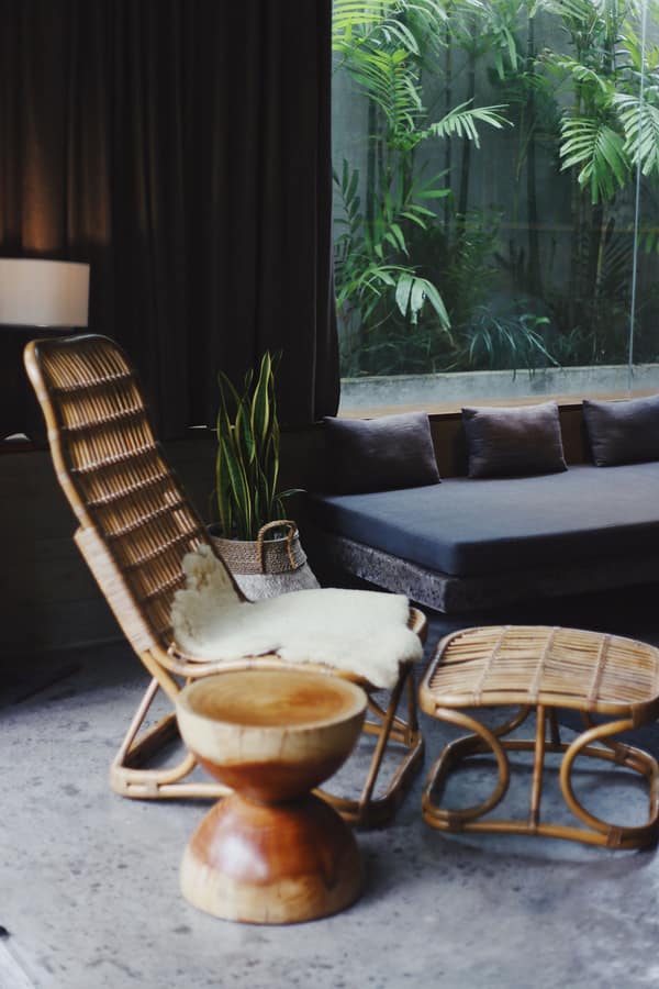 Laid-back rattan chair in a breezy interior