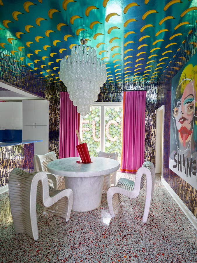 Bold, colorful dining space inside pop artist Ashley Longshore's New Orleans home.