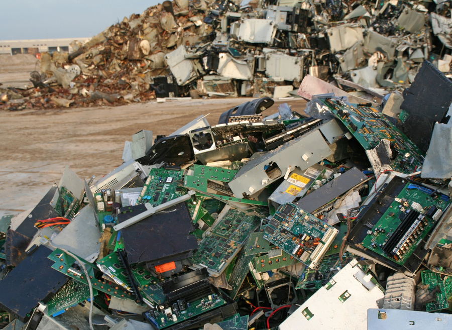 Large pile of e-waste in a junkyard. 