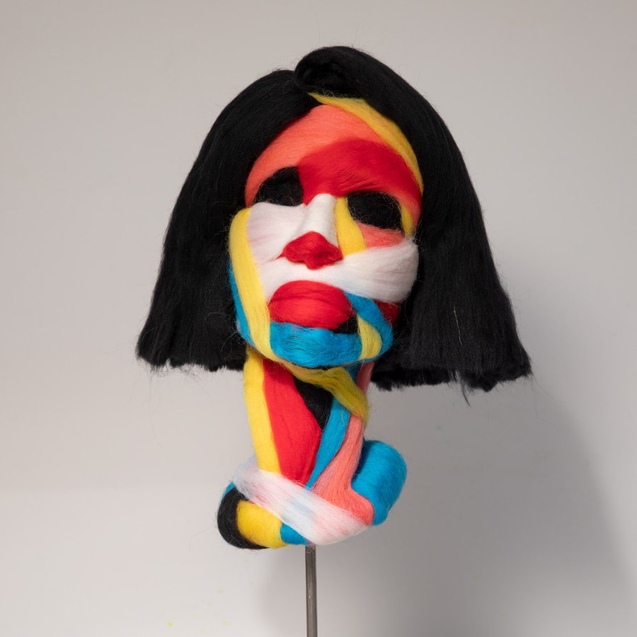 Super colorful female bust with jet-black hair by artist Salman Khoshroo.