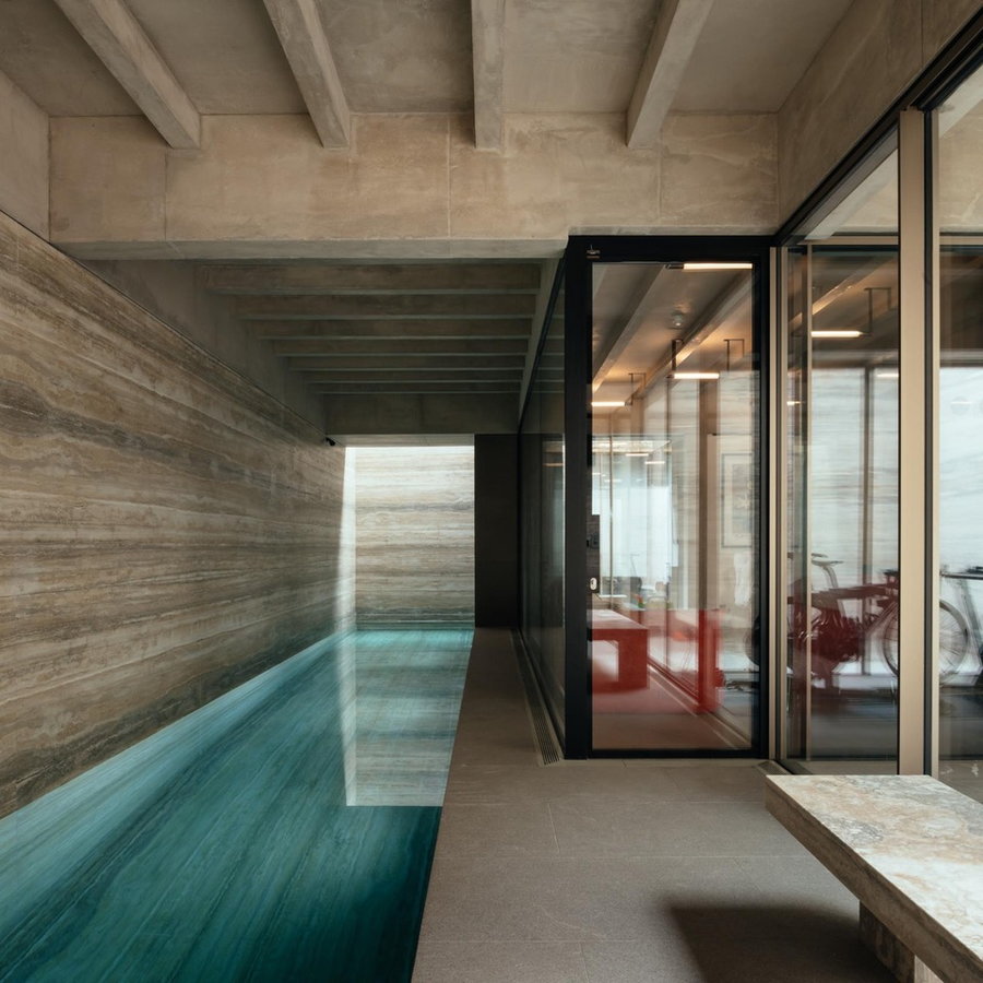 Modern indoor swimming pool inside the Jamie Fobert-renovated house on London's Primrose Hill. 