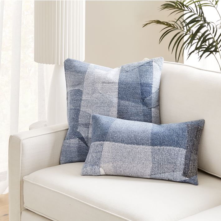 Elegant upcycled throw pillows featured in the new West Elm + Eileen Fisher Collection.