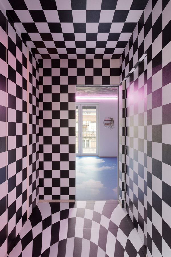 Black-and-white checkered hallway inside the 