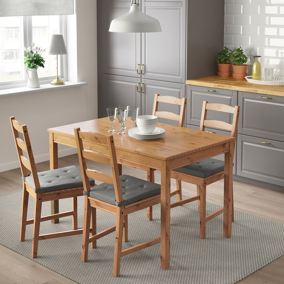 IKEA's JOKKMOKK dining table in a contemporary kitchen setting.