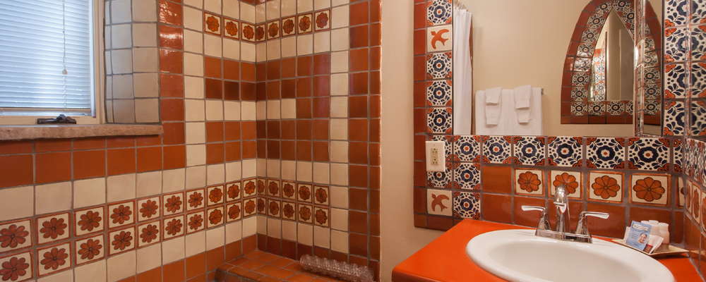 Adorable private baths in each guest room- all unique, but each an enhances the historic Old Santa Fe accommodation experience!