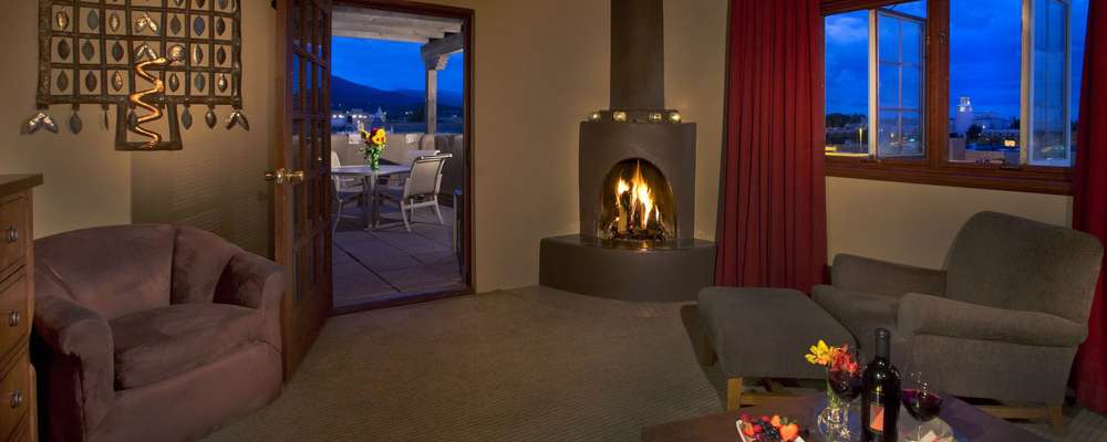 Many suites provide the warm ambiance of a wood burning kiva fireplace. Many suites provide the warm ambiance of a wood burning kiva fireplace.