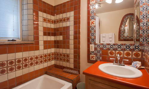 Adorable private baths in each guest room- all unique, but each an enhances the historic Old Santa Fe accommodation experience!