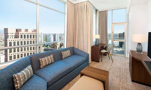 Some suites feature a step out balcony to enjoy the city and mountain views. Some suites feature a step out balcony to enjoy the city and mountain views.