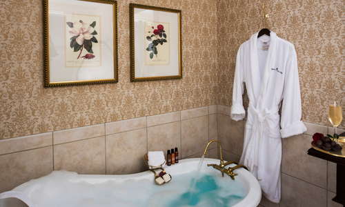 The claw foot soaking tub is a feature of the Historic Deluxe room.