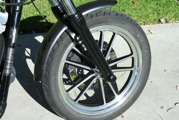 Custom painting your rims can make a huge difference in the personality of your Softail