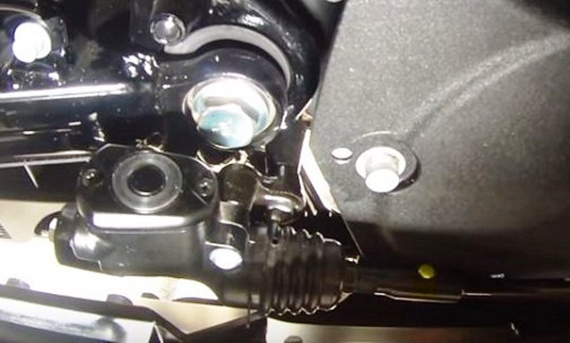 Remove circlip and pull retaining pin holding the brake rod to the actuator