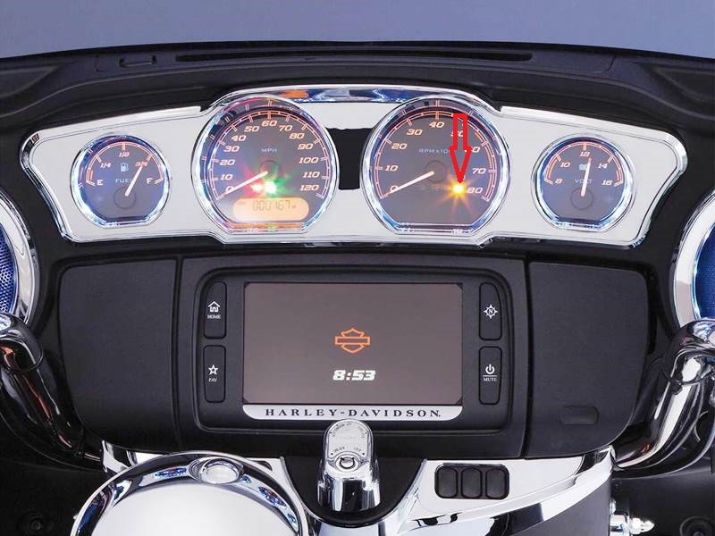 ABS light on touring dashboard of late model Harley Davidson.