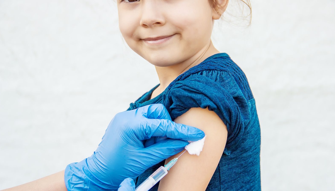 girl getting a vaccination