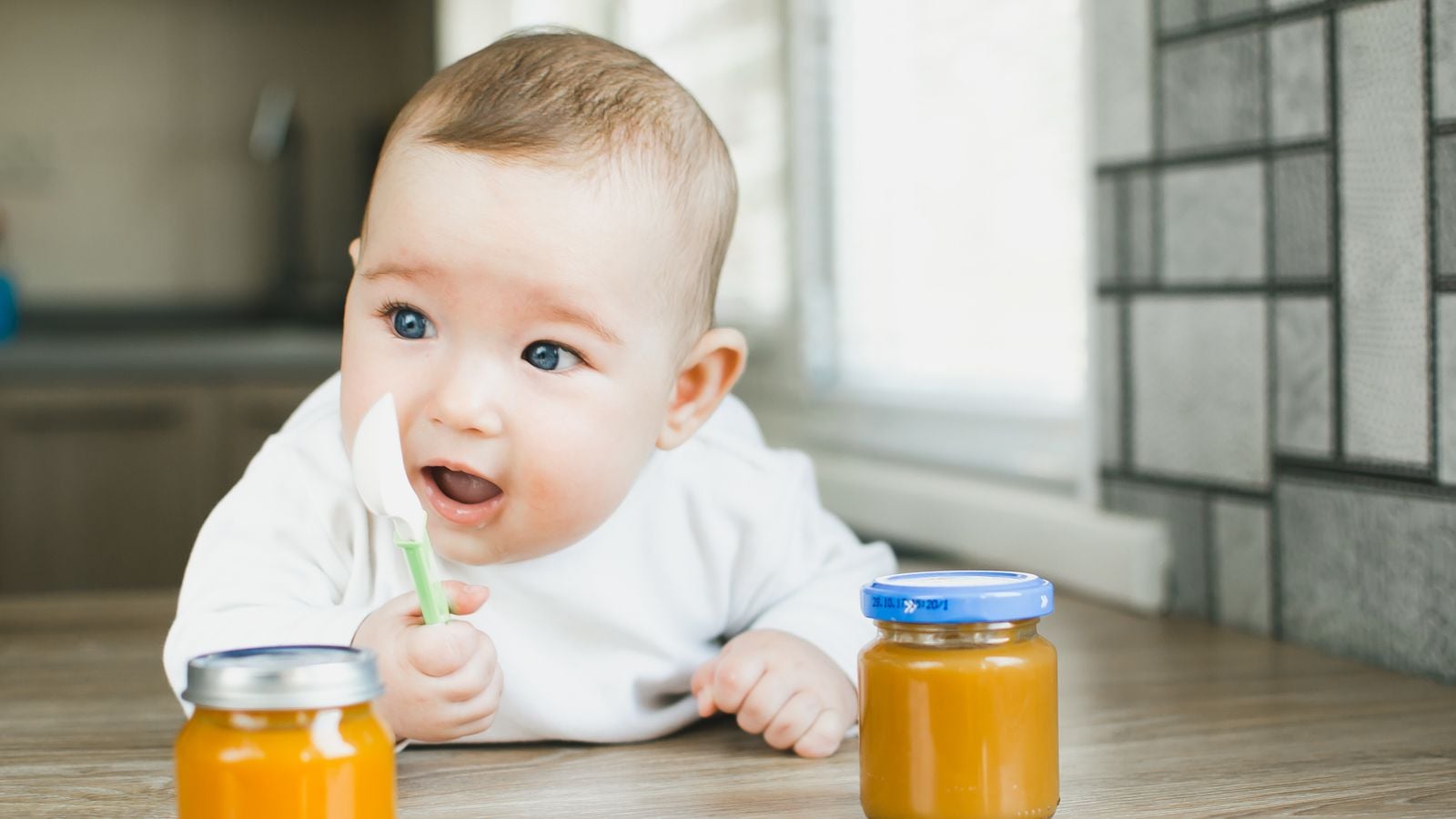 baby with baby food