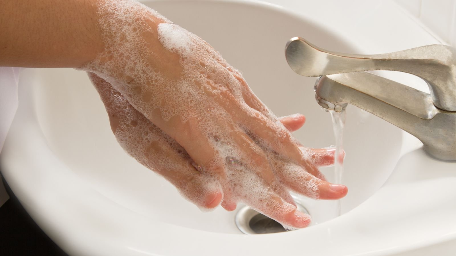 woman washing hands